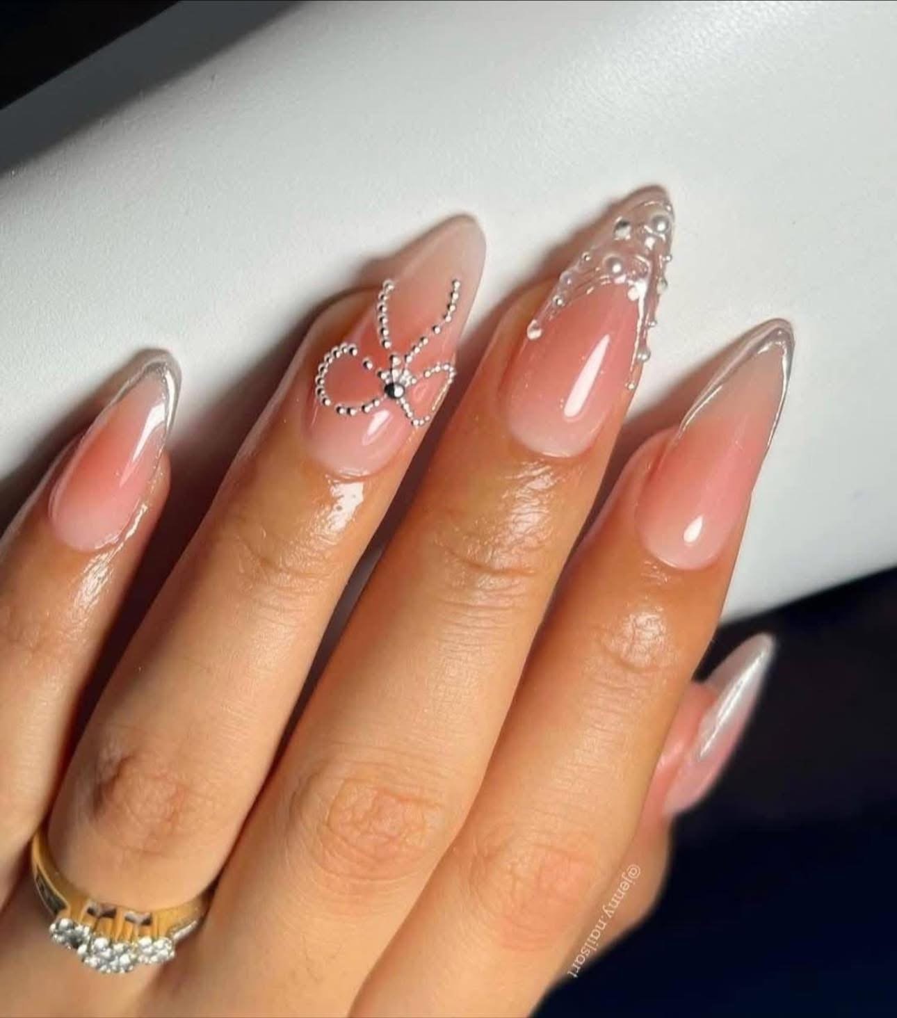 Crystal bow pearl nails with clear French tips